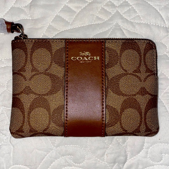 Brown Leather Coach Wristlet. Pockets for cards and zipper for coins inside. - Picture 1 of 3